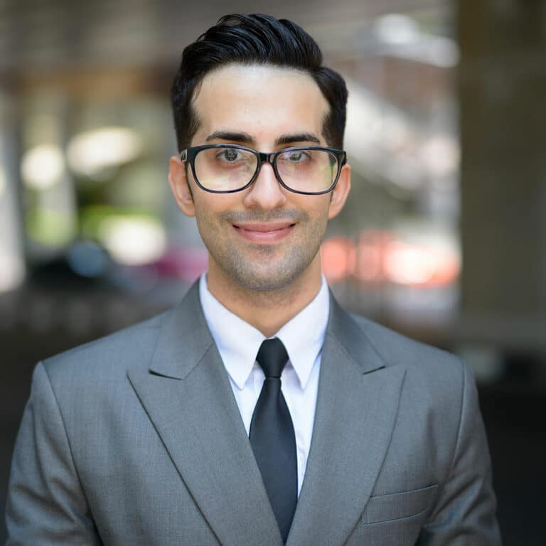 face-of-happy-young-handsome-persian-businessman-i-SPZRPFV.jpg